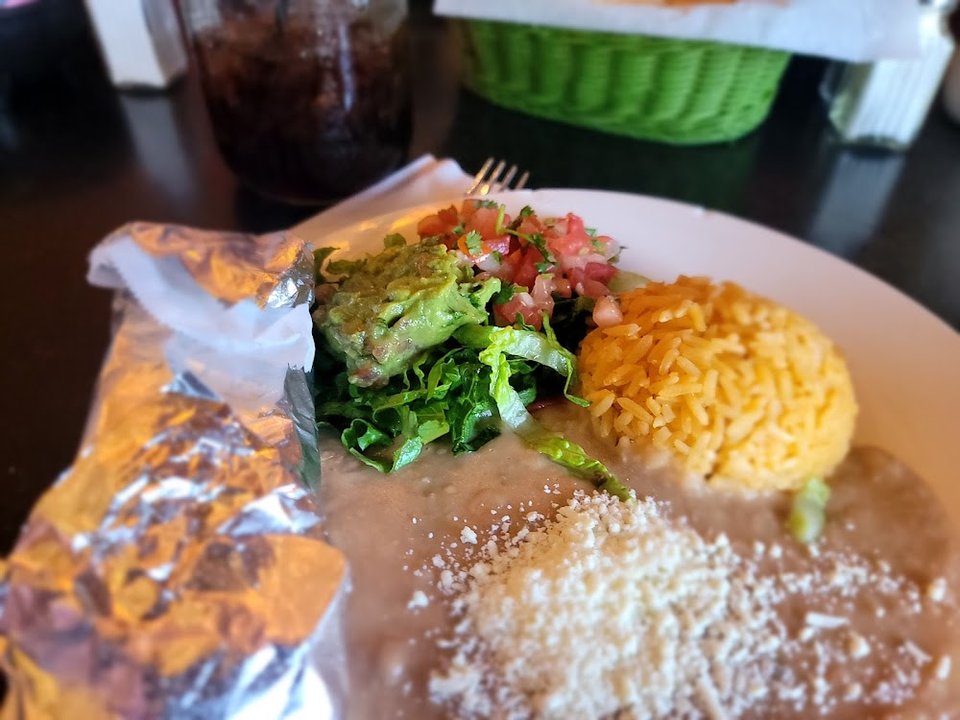 Menu page with salads, omelettes, and comfort food.