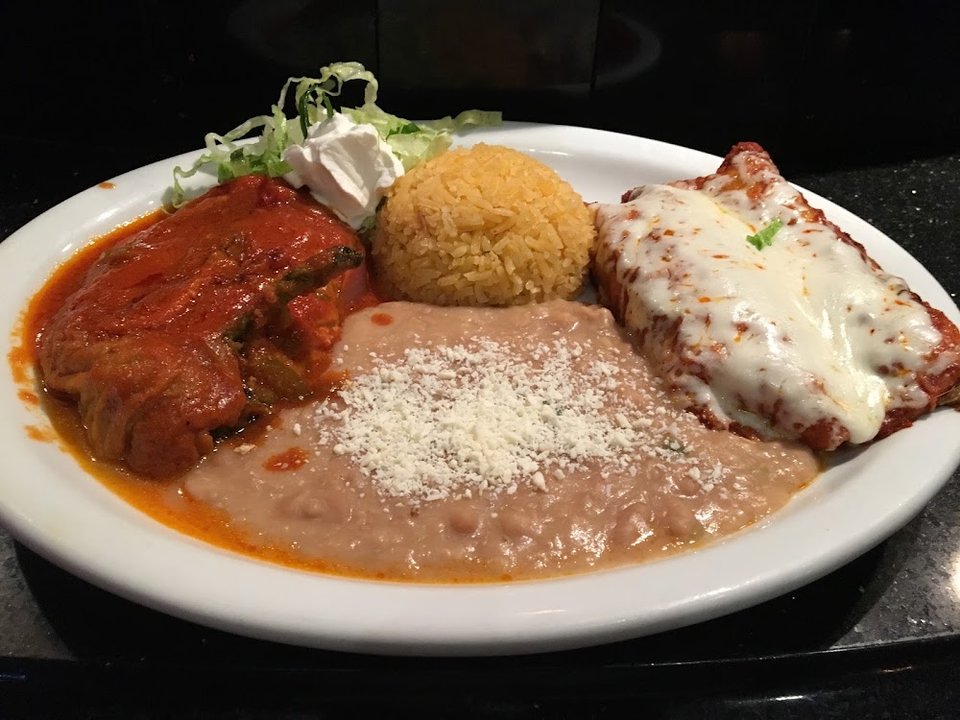 Mexican menu with appetizers, fajitas, and dinner plates.