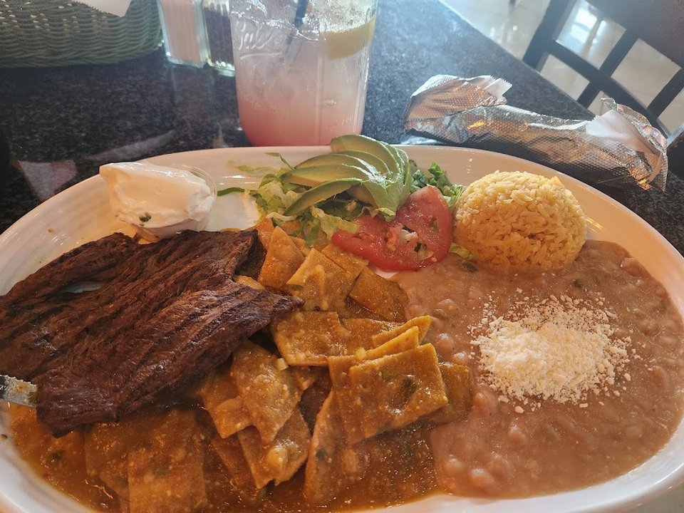 Restaurant menu featuring small plates and vegetarian options.