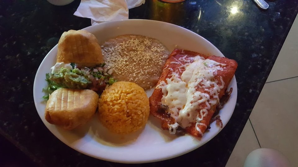 Mexican menu with appetizers, fajitas, and dinner plates.